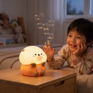 veilleuse loutre en silicone souple Otti qui souffle des bulles avec enfant lit rituel dodo