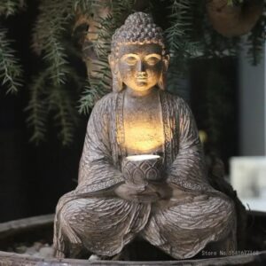 Statue de Bouddha lumineuse solaire en résine pour jardin et intérieur diffusant une lumière apaisante